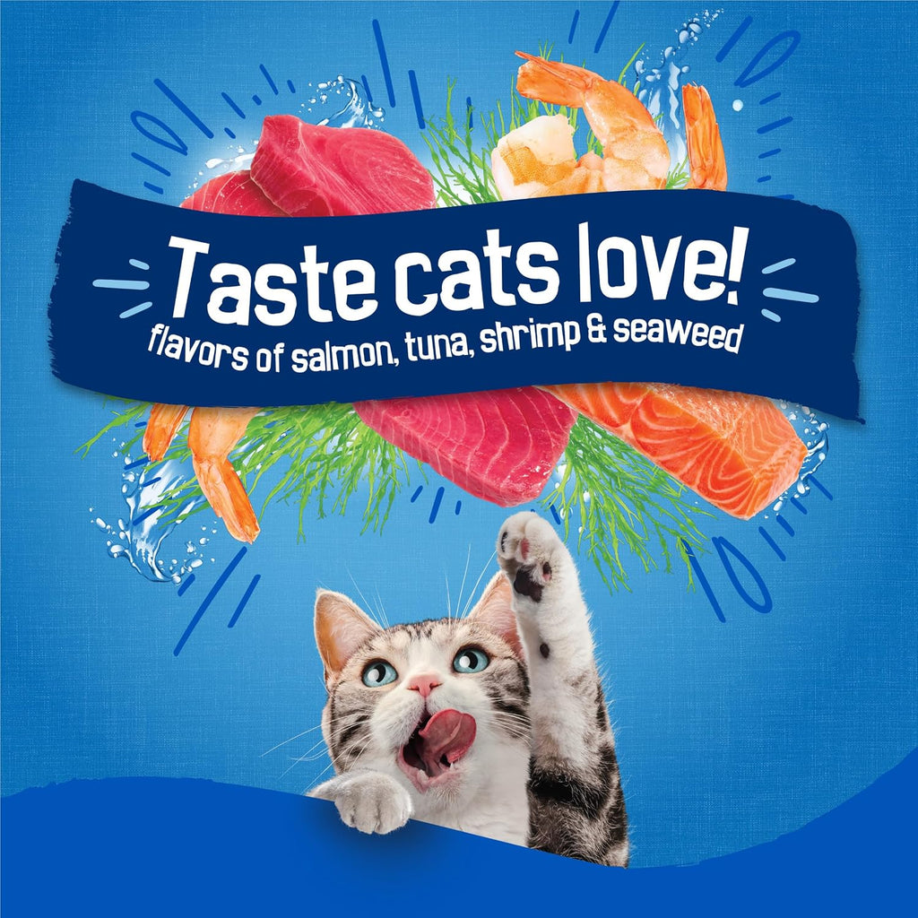 JMA Pet Goods Friskies Seafood Sensations cat food with salmon, tuna, shrimp and seaweed flavors and a cat licking its lips